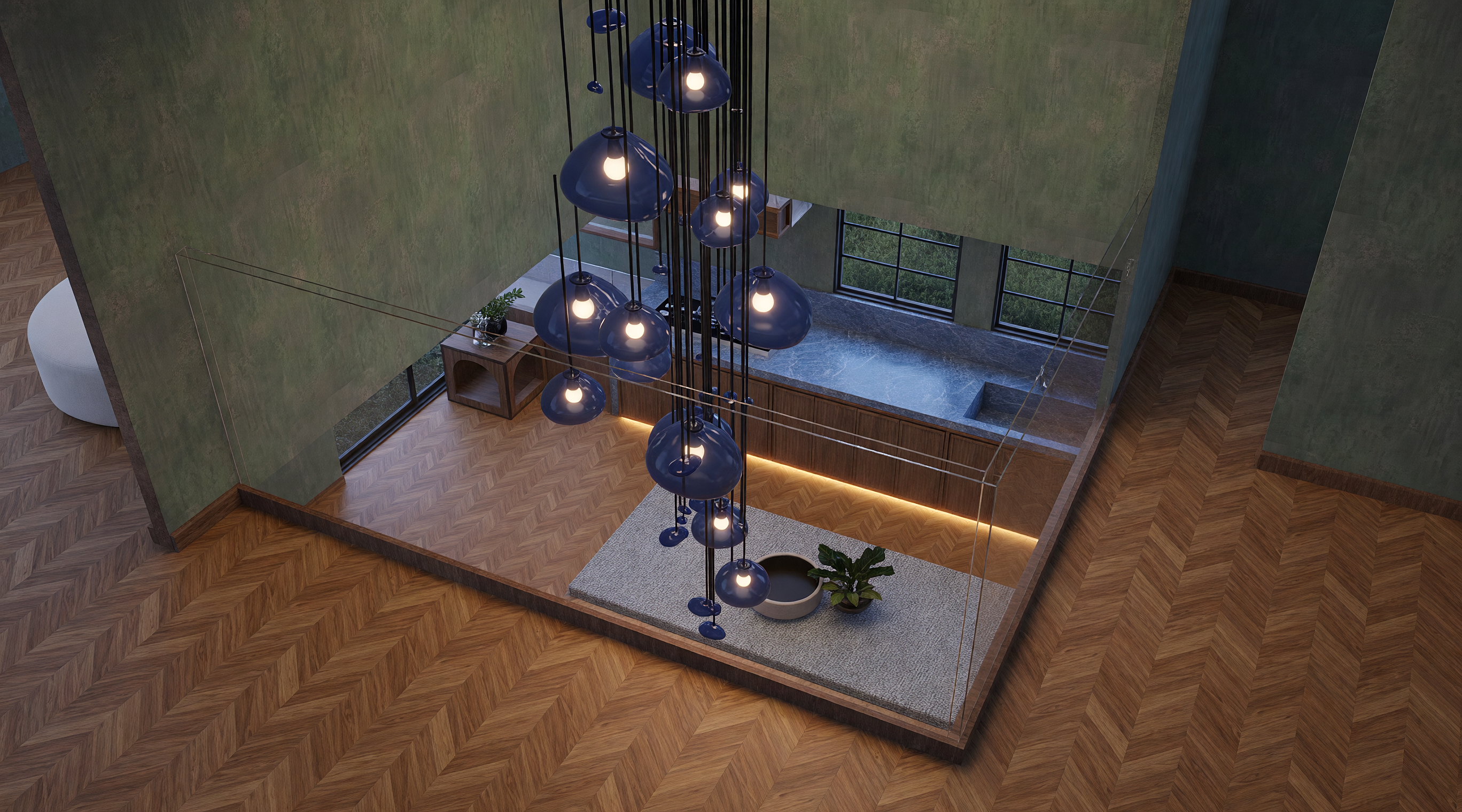 Overhead view of blue glass pendants above the herringbone floor